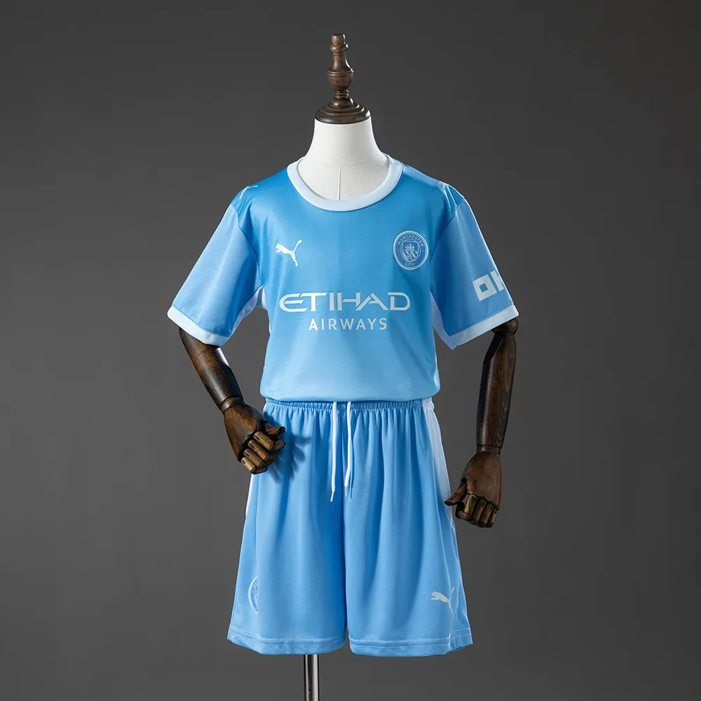 Manchester City 26/27 Home Kids Kit — 1/2